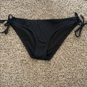 Black bikini bottom with adjustable side ties